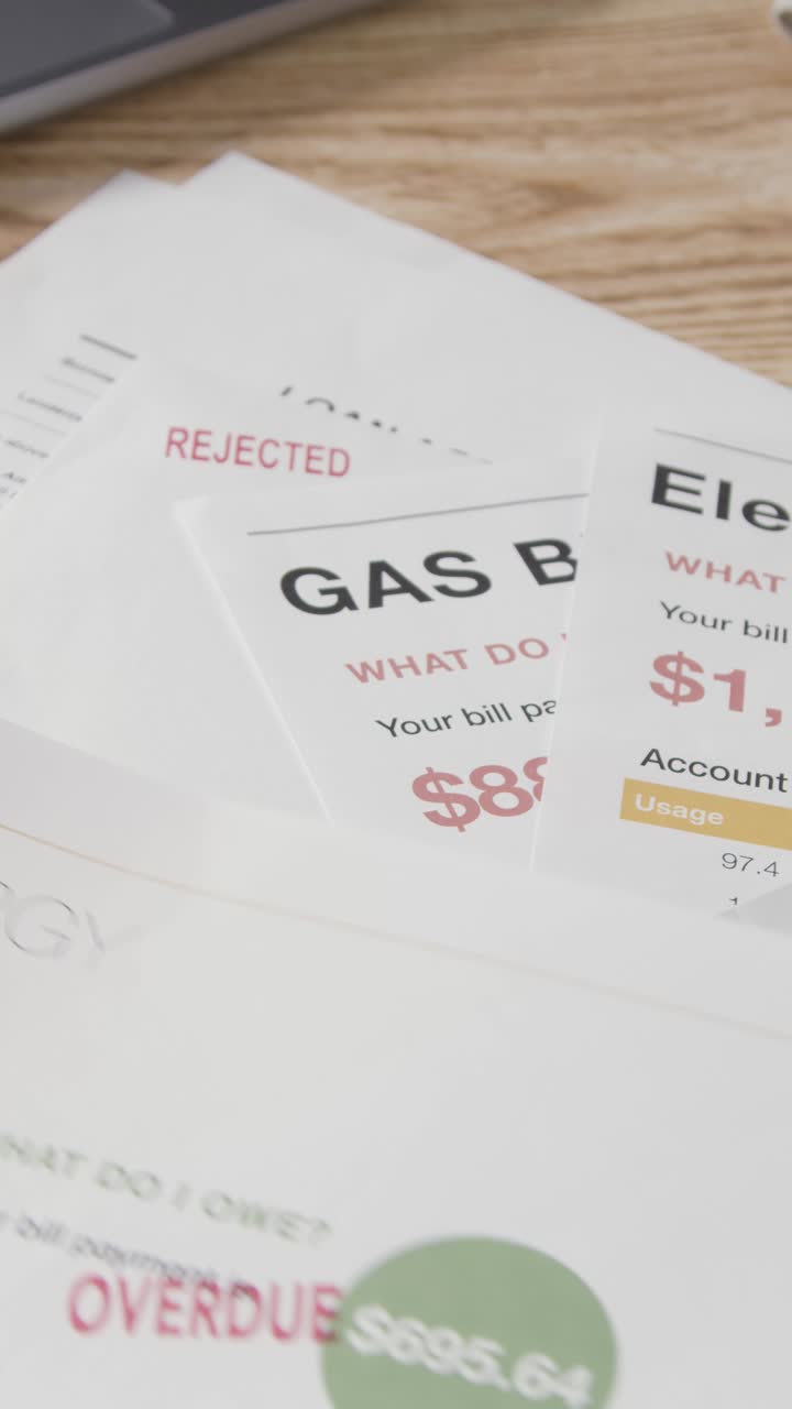 Vertical Video Of Overdue US Bills For Energy, Mortgage And Broadband 1