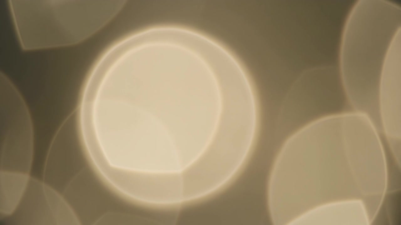 Abstract La luce dorata Bokeh sullo sfondo