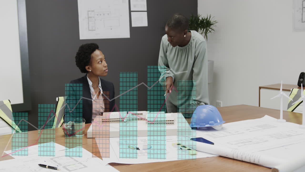 Animation of growing graphs over diverse female architects discussing 3d model of building in office