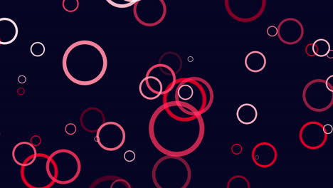 Schwebende-Rote-Kreise,-Faszinierendes-Muster-Auf-Schwarzem-Hintergrund