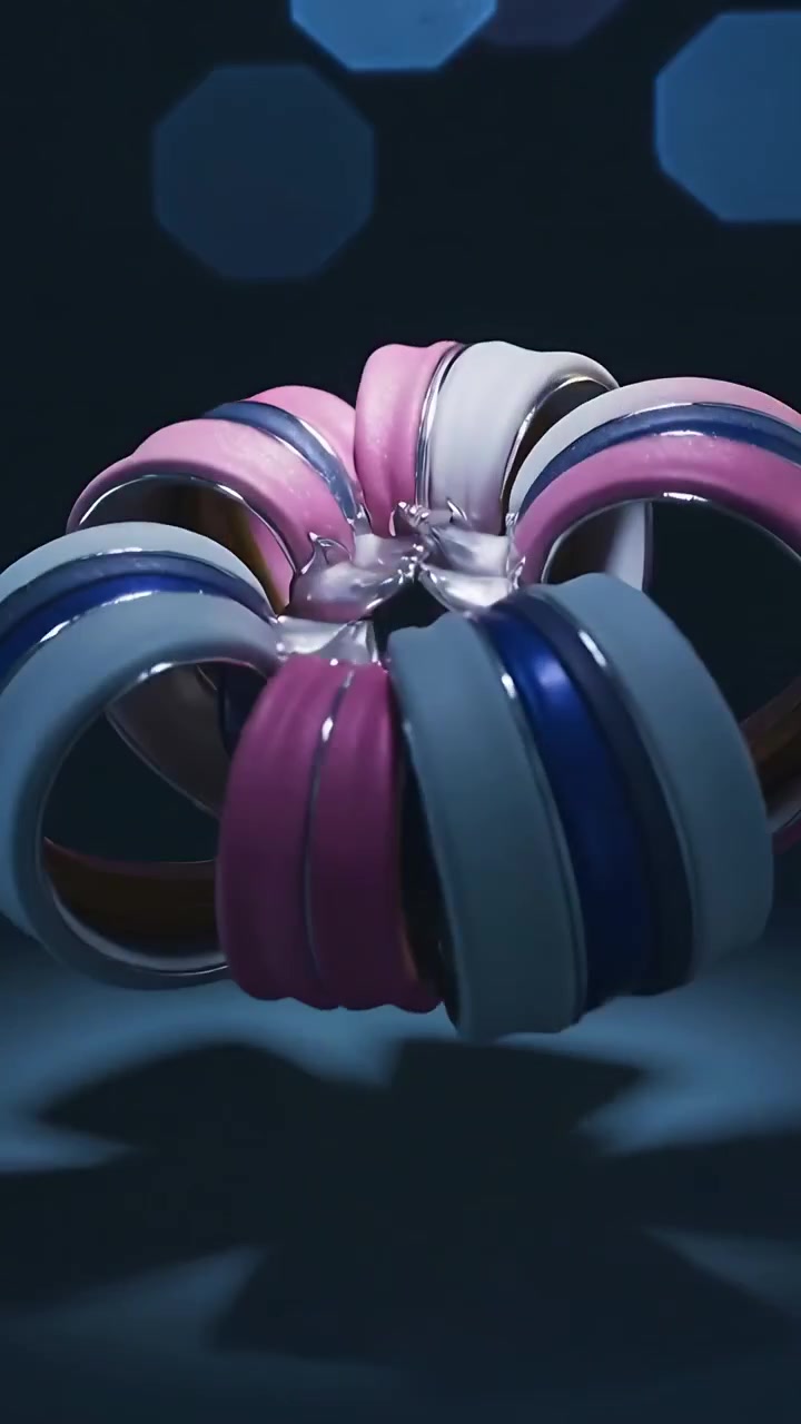 Vertical video: Panning camera showing metal petals coiling into rosette for display in studio