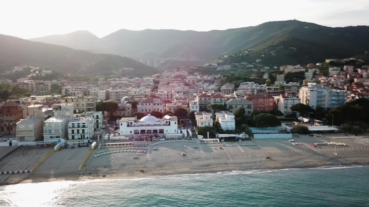Aerial drone shot of a village next to the Mediterranean sea, genoa, Italy