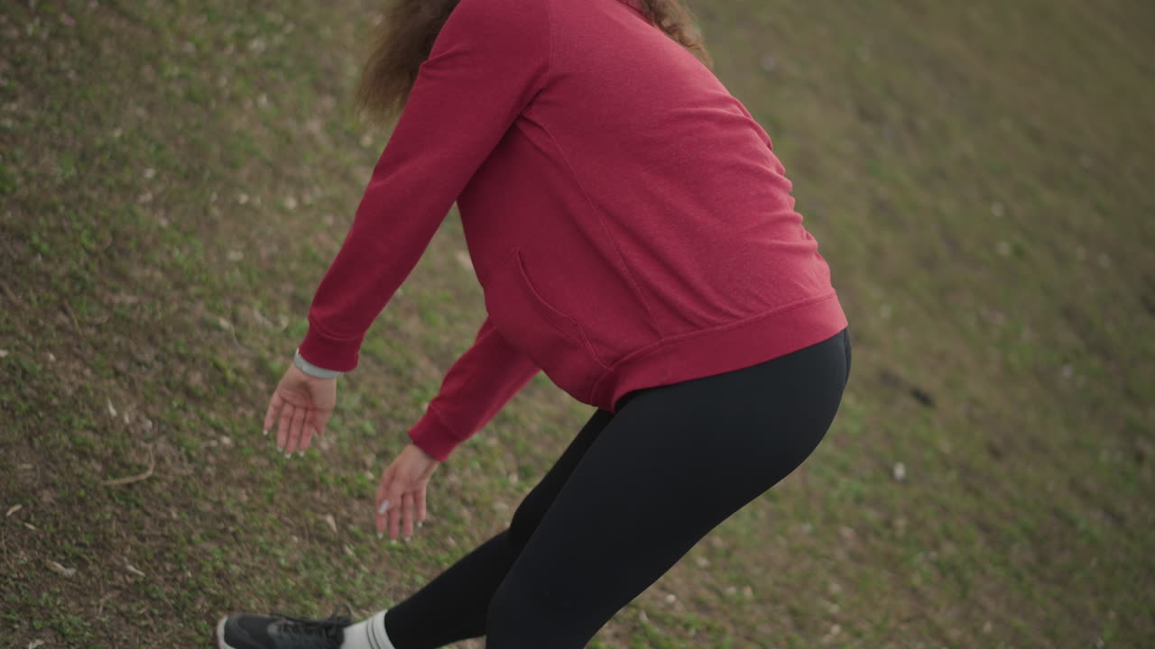 Preparing For Run, Woman Prepares Herself By Adjusting Shoe And Checking Posture Carefully, Woman Concentrates On Lacing Her Shoe Correctly And Aligning Her Posture Before Starting To Run