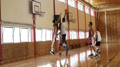 basketball players playing in the court