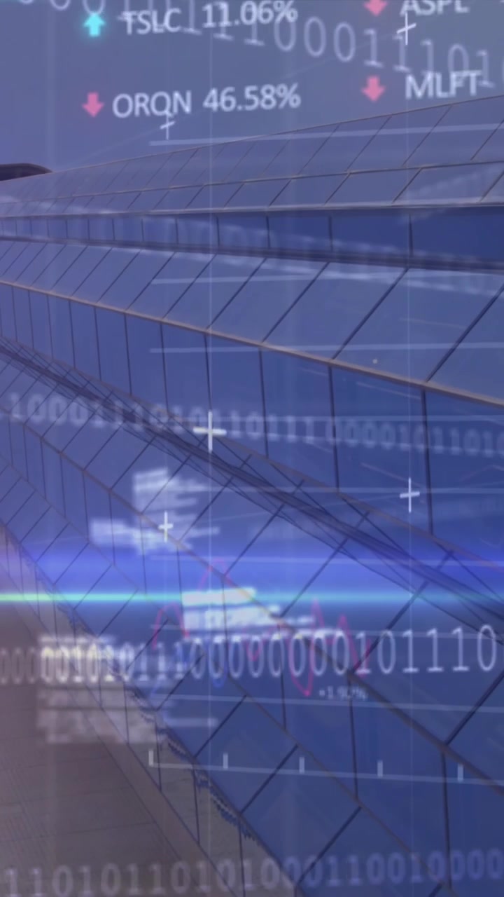 Animation of stock market data processing and light trails against low angle view of tall building