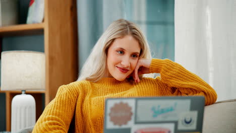 woman using laptop at home