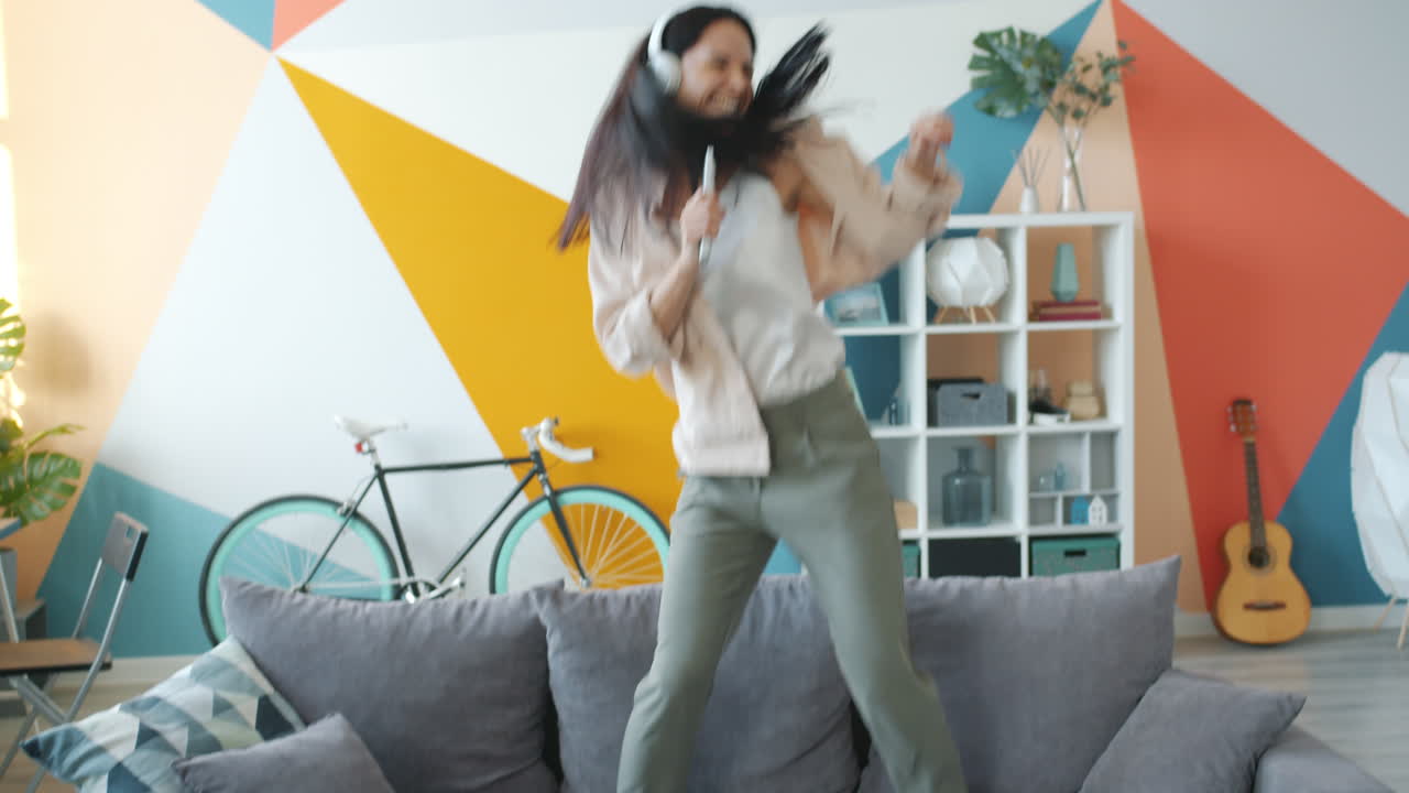 Woman Dancing and Singing at Home