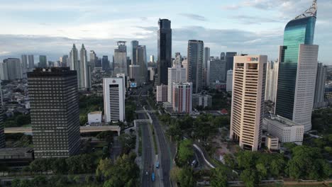 aerial jakarta view from above sudirman street in the morning with building and rush hours view