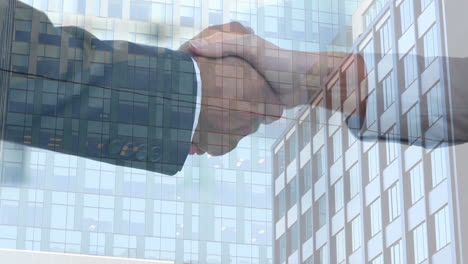 digital composition of business people shaking hands against tall buildings in background