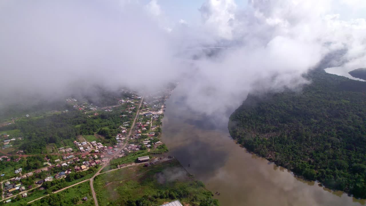 Aerial view of rural residential area alongside the river, South America, Suriname