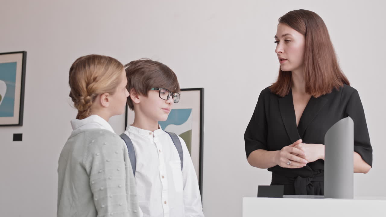 Museum Worker Talking to Kids