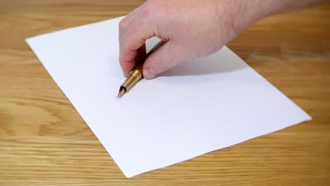 A-sheet-of-blank-white-paper-is-placed-on-a-wooden-desk