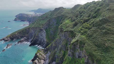 drone flight over the torrs cliffs and rugged coastline – ilfracombe, devon, uk
