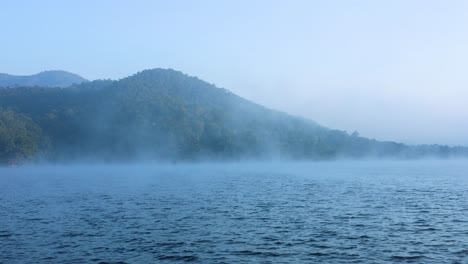 foggy river with mountains in chiang mai