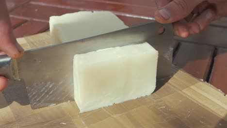 cutting natural homemade bar soap into bars