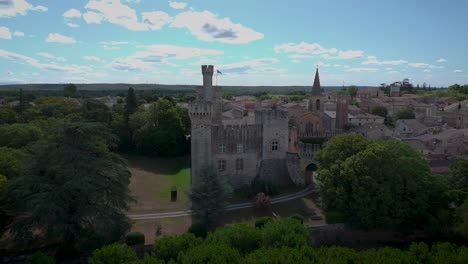 Aerial-of-Château-de-Pouzilhac,-majestic-castle,-located-in-the-heart-of-Provence,-France,-exudes-an-air-of-timeless-elegance