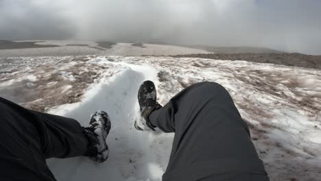 First-person-perspective-while-glissading-down-Mount-Rainier's-snow-fields