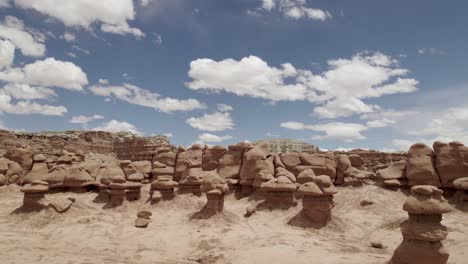 Hoodoos-and-cliffs-against-cloudy-sky