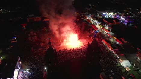 crowds of people watching, people celebrating all over the streets of almoloya