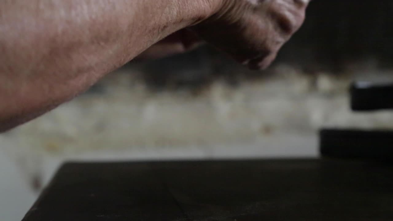 A woman prepares bread and cookies