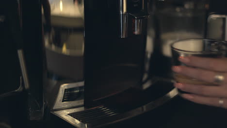 espresso being made in a coffee machine