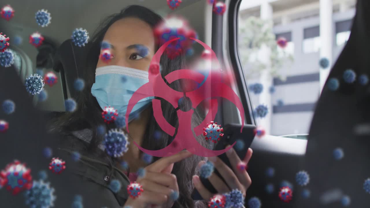 Woman in moving car tapping phone as 3D virus particles drifting biohazard sign showing health risk