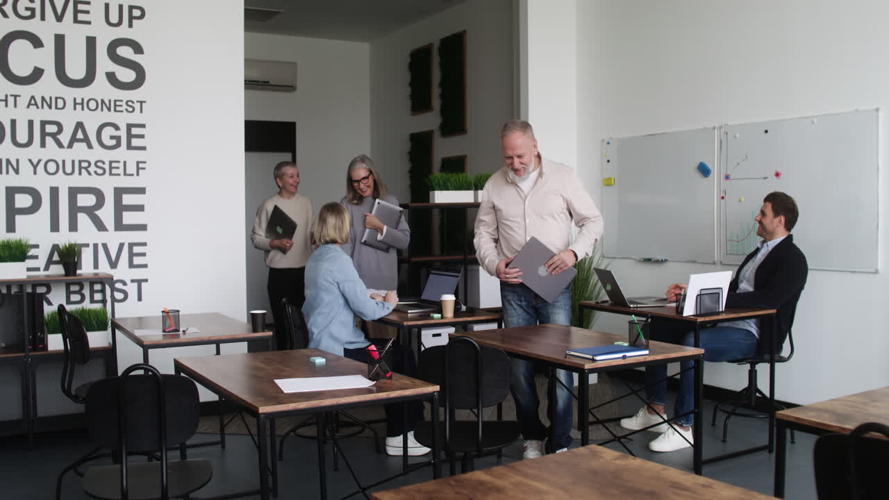 Male teacher starting the class