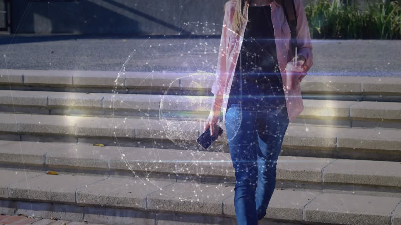 Adult female descending steps holding phone AR sphere shifting settling on brick path for tech demo
