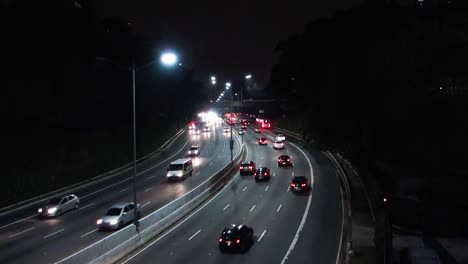 vehicles traffic on the '23 de maio' avenue in sao paulo city, at night