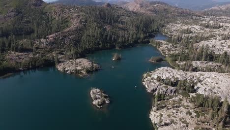 aerial of alpine lake in the sierra mountains