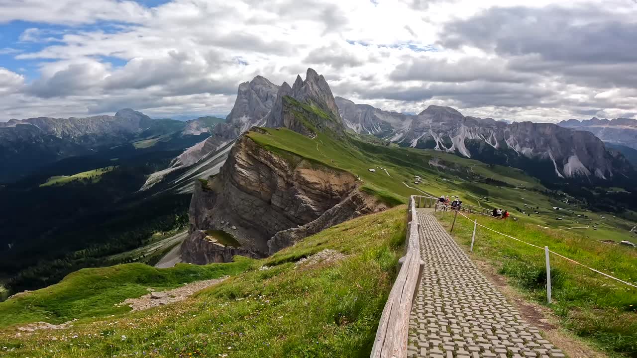 Seceda mountain glowing under summer sun in dolomites, italy