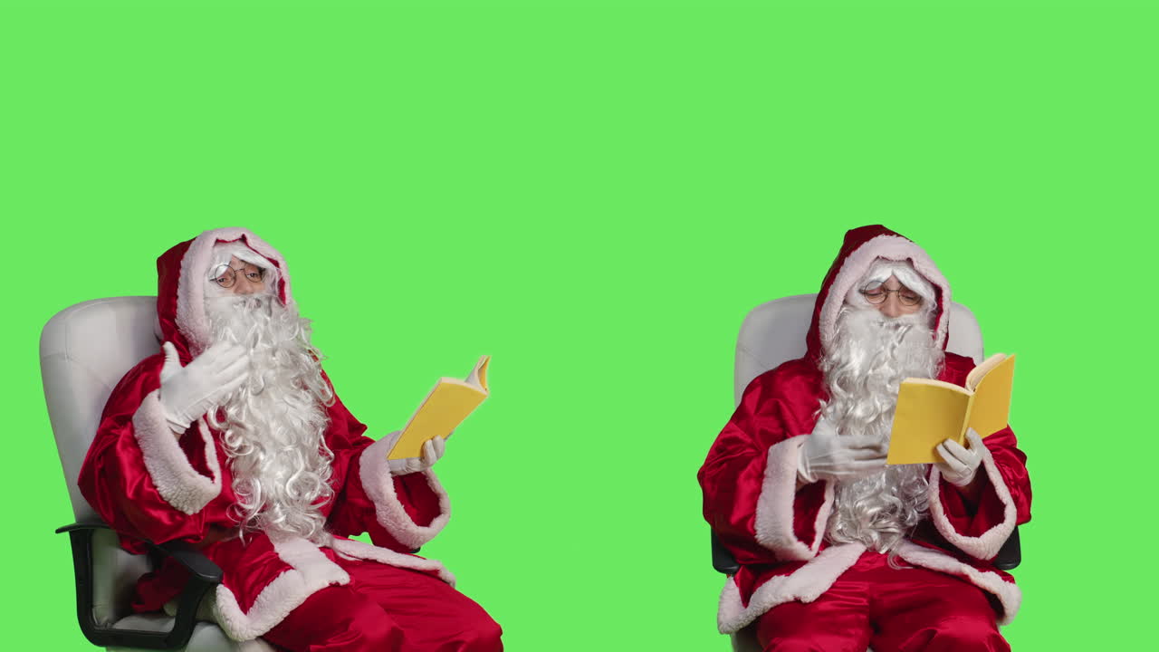 Santa Claus reading books on green screen