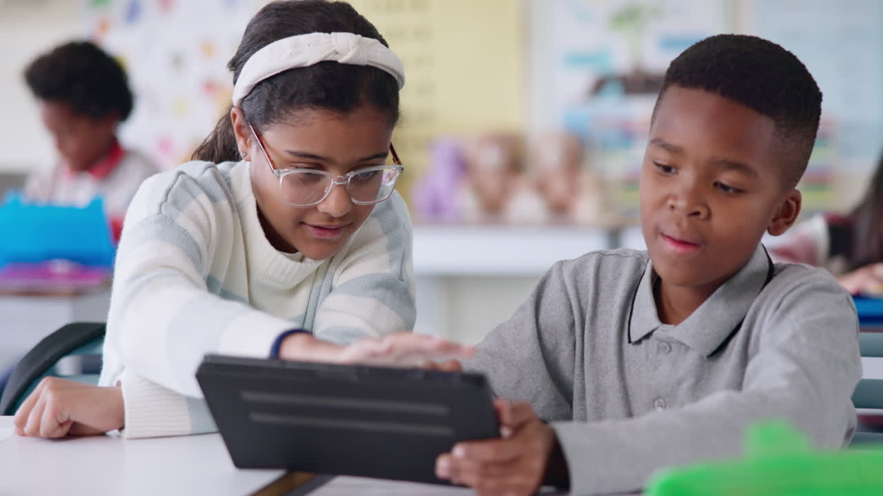 Children learning with a tablet in the classroom