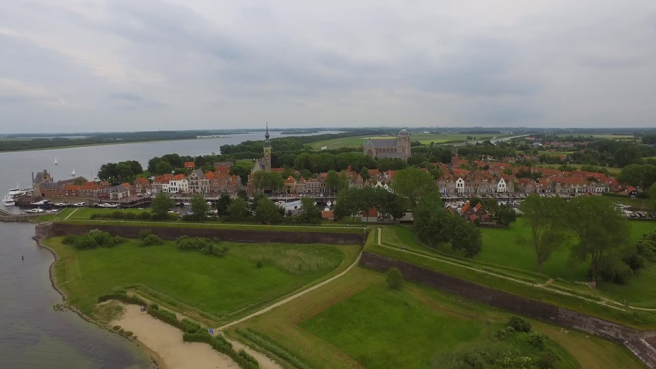 Aerial View of a Historic Town by the River