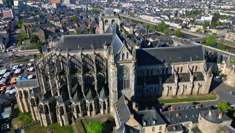 magnificent le mans cathedral or cathédrale saint-julien du mans, marché des jacobins and surrounding city, sarthe, france. aerial drone pov