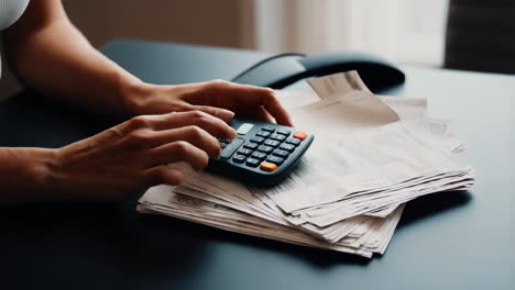 paying bills with calculator