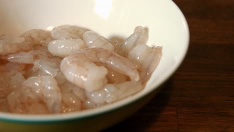 Slow-Pan-Across-Raw-King-Prawns-in-Bowl