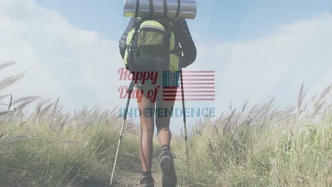 animation of independence day text over biracial woman hiking