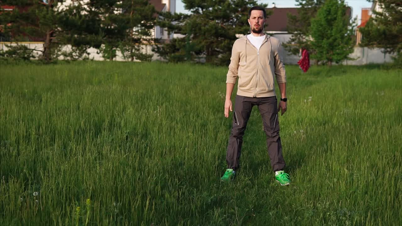 Man Doing Squats Outdoors