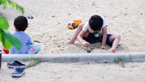 child engages with colorful toys outdoors