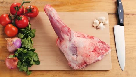 preparing raw lamb leg