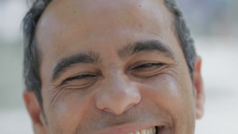 Cropped-shot-of-happy-man-laughing-outdoor