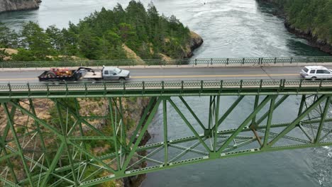 aerial view pulling away from the bridge at deception pass state park