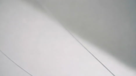 light gray surface with shadows and lines