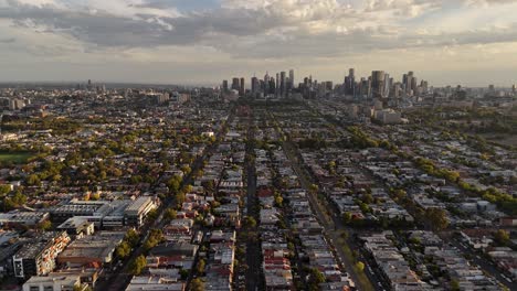 Aerial-view-of-the-Brunswick-area-of-the-city-of-Melbourne,-the-skyscrapers-in-the-background