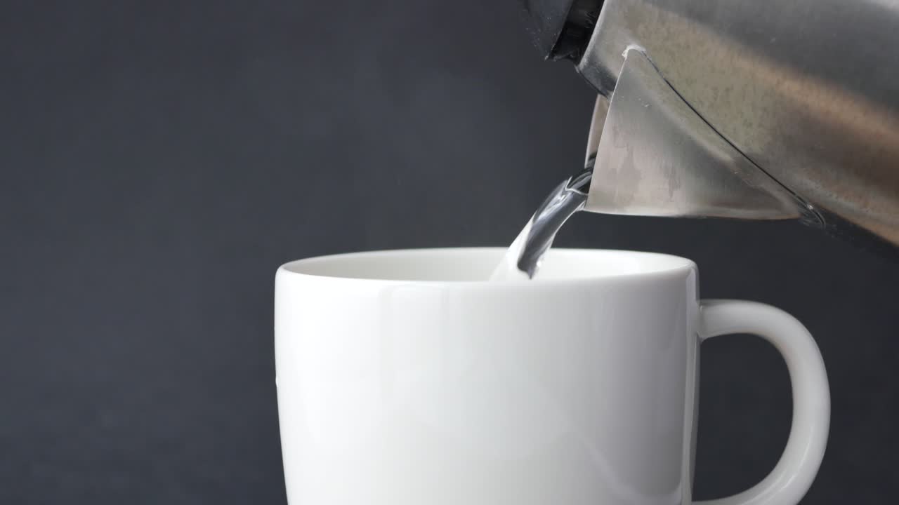 Hot water in a jar on table ,