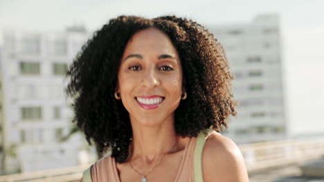 Portrait-of-woman,-kiss-and-smile-in-city-sidewalk