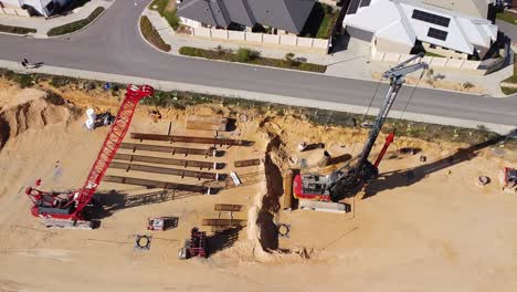 Aerial-Orbit-Over-Construction-Cranes,-Yanchep-Rail-Extension-Works-Butler-Perth