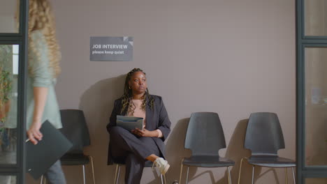african american woman waiting for job interview