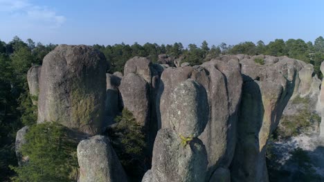 aerial orbit shot of a rock formation in el valle de loss monies, copper canyon region, chihuahua